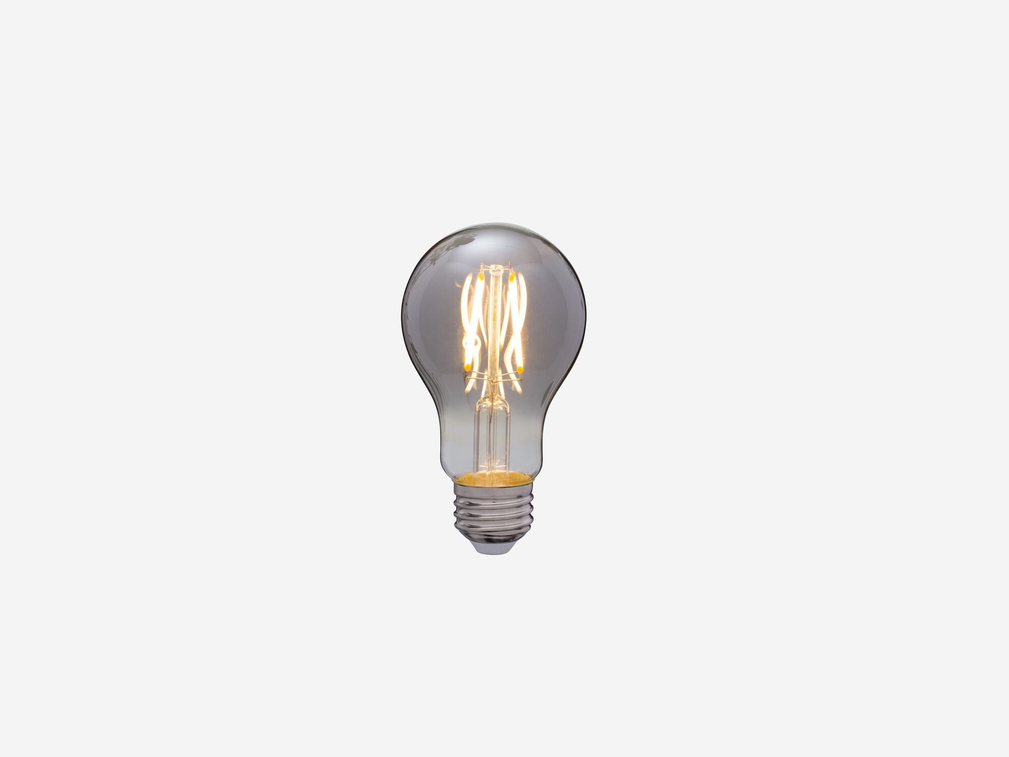 Small smoked grey lightbulb with light on front view